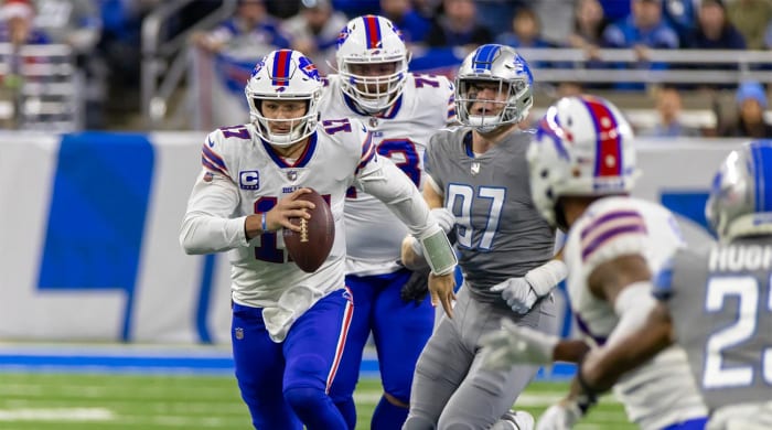 Nov 24, 2022; Detroit, Michigan, USA; Buffalo Bills quarterback Josh Allen (17) runs with the ball against the Detroit Lions during the first quarter at Ford Field.